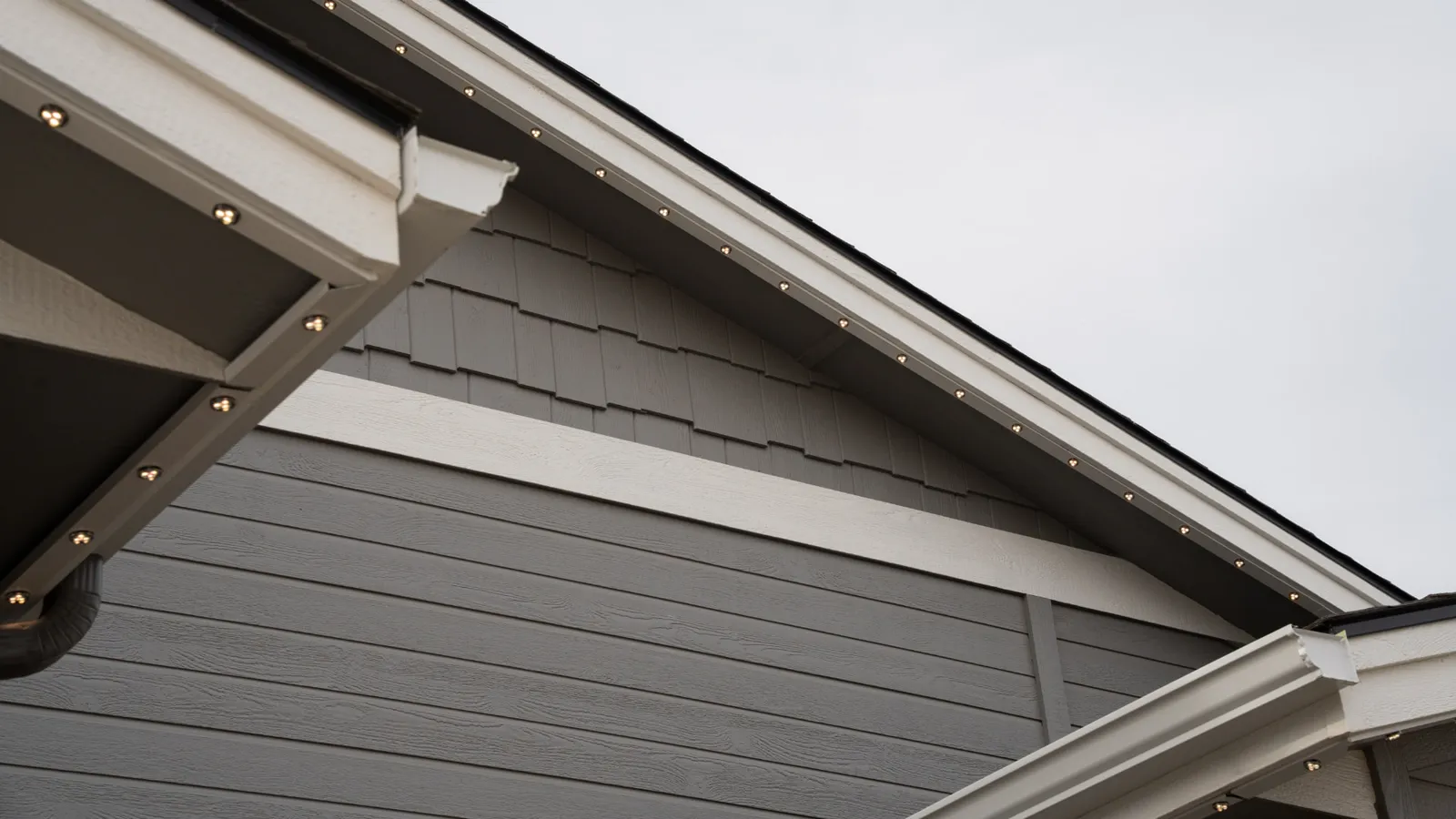 Permanent lighting track blended into the roofline in daylight